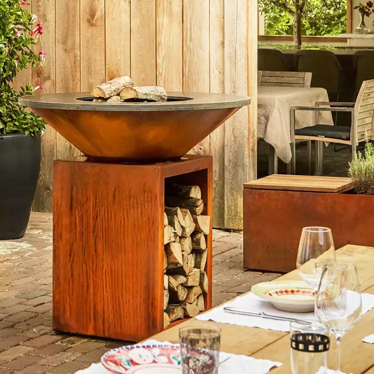 Large weather-resistant wood-burning barbecue outdoor grills with storage bins are preferred for parties and cooking